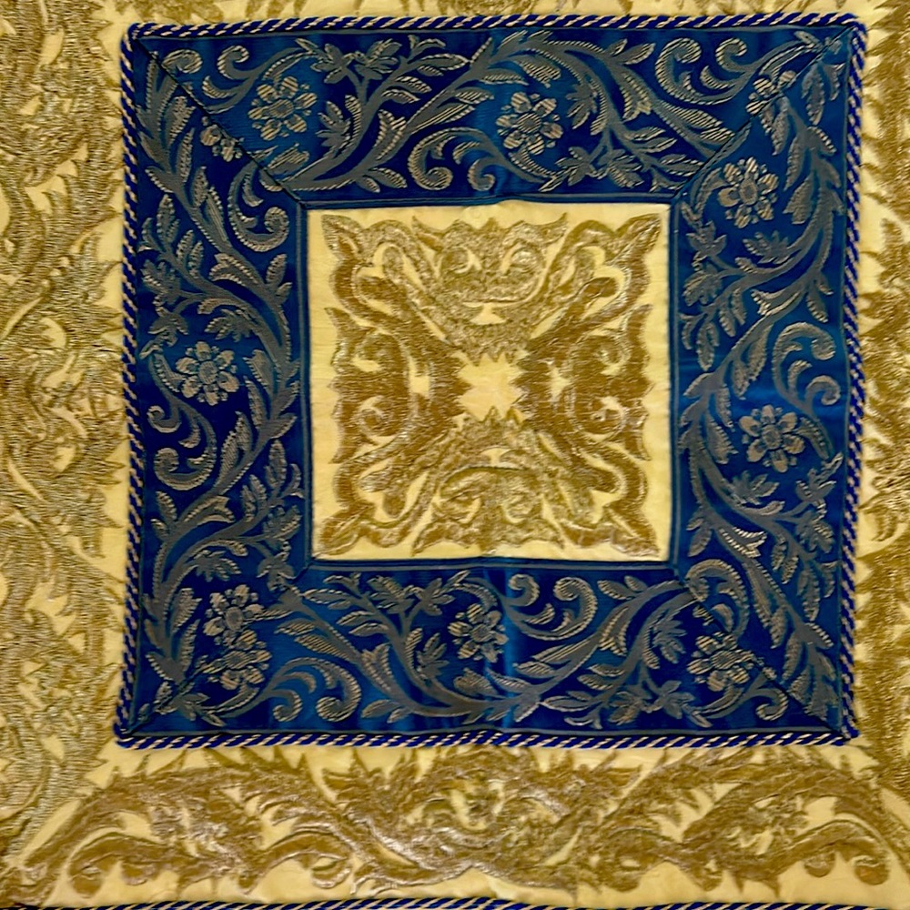 Elegant gold and blue table topper.